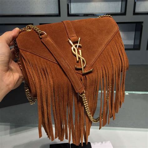 ysl fringe clutch bag|YSL clutch bag with chain.